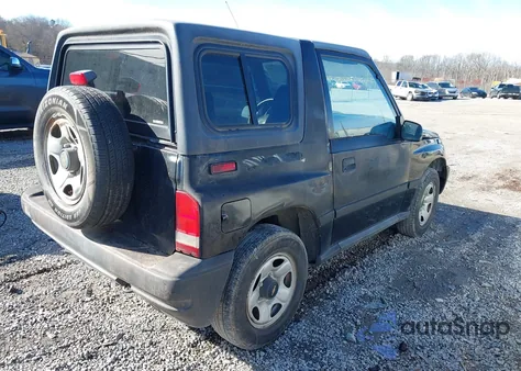 1998 Chevrolet Tracker z USA, uszkodzony, nr VIN 2CNBE1867W6923242